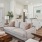 a living room with a couch and a table