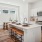 a kitchen with white cabinets