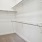 a white wall with a metal railing